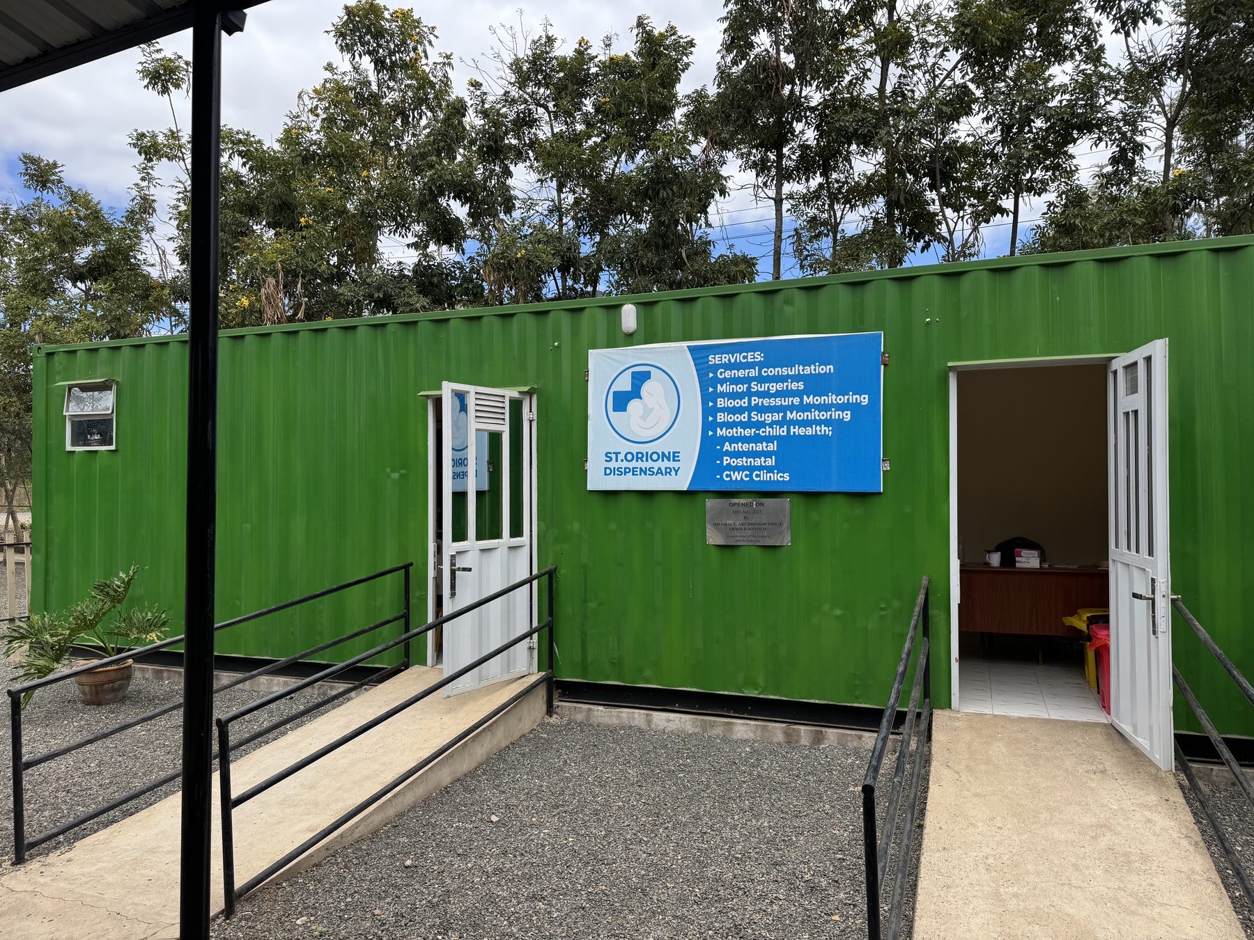 The entrance of the St. Orione Dispensary, with its access ramp