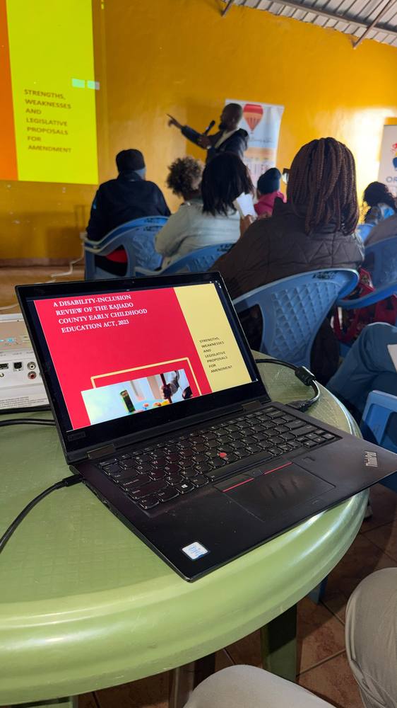 A speaker presents on disability-inclusive early childhood education during the training