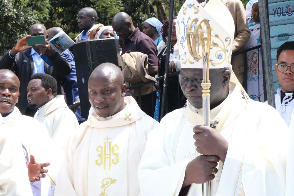 Archbishop Philip Anyolo in procession after the ordination Mass