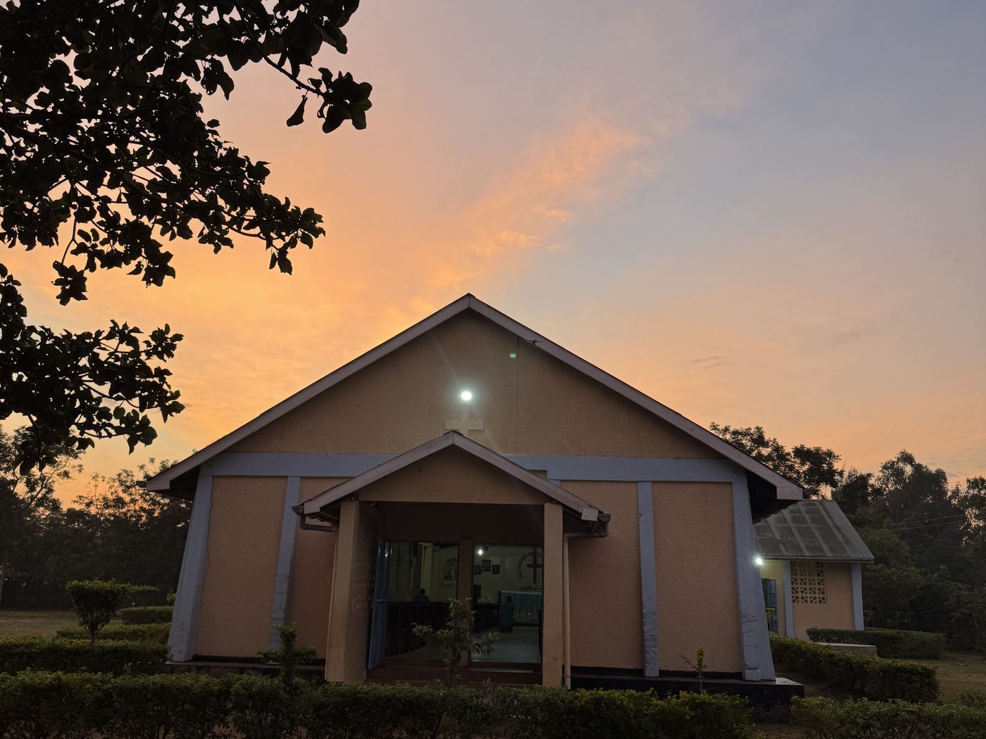The parish church at Nyadorera under an evening sky